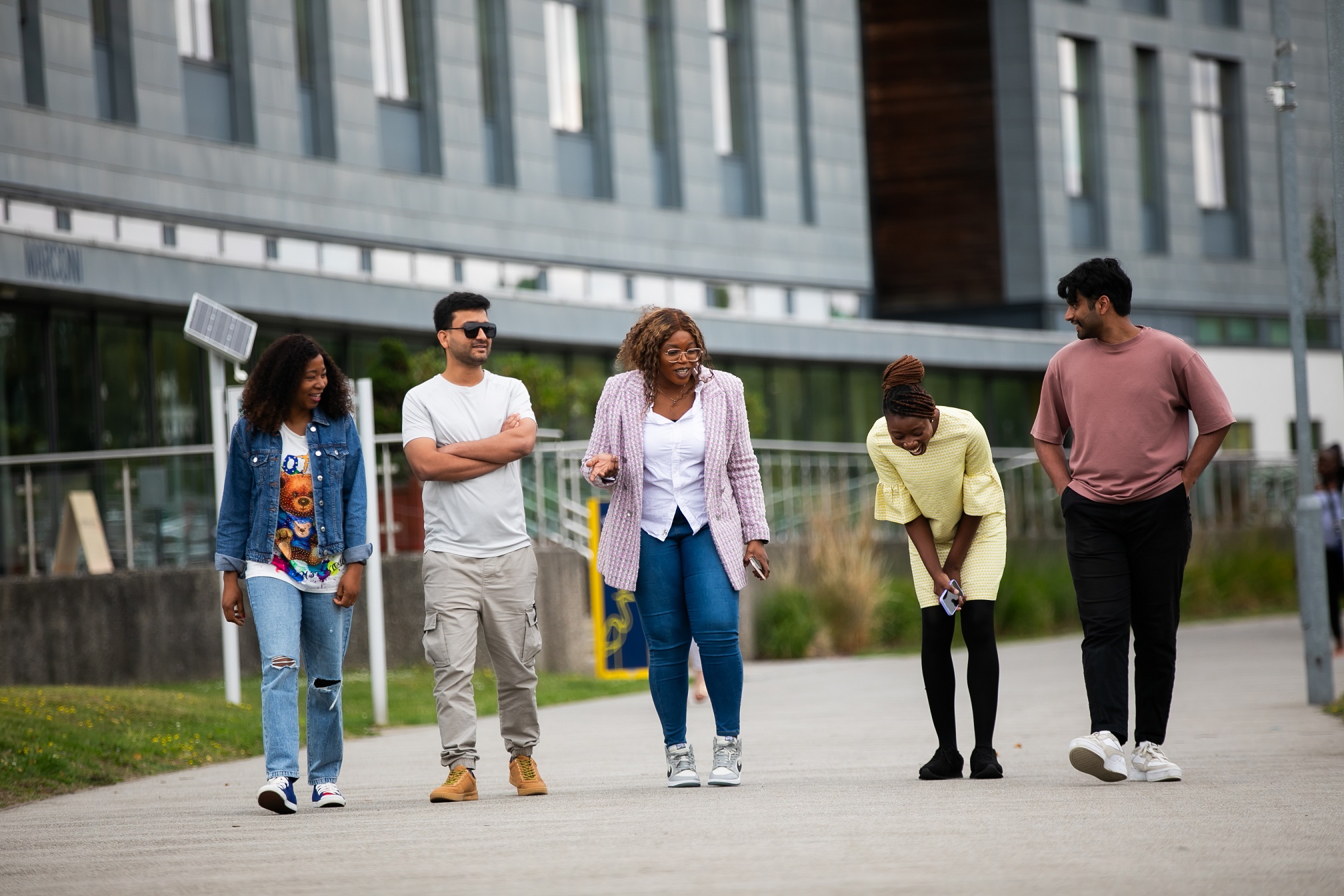 Students walking outside Anglia Ruskin University